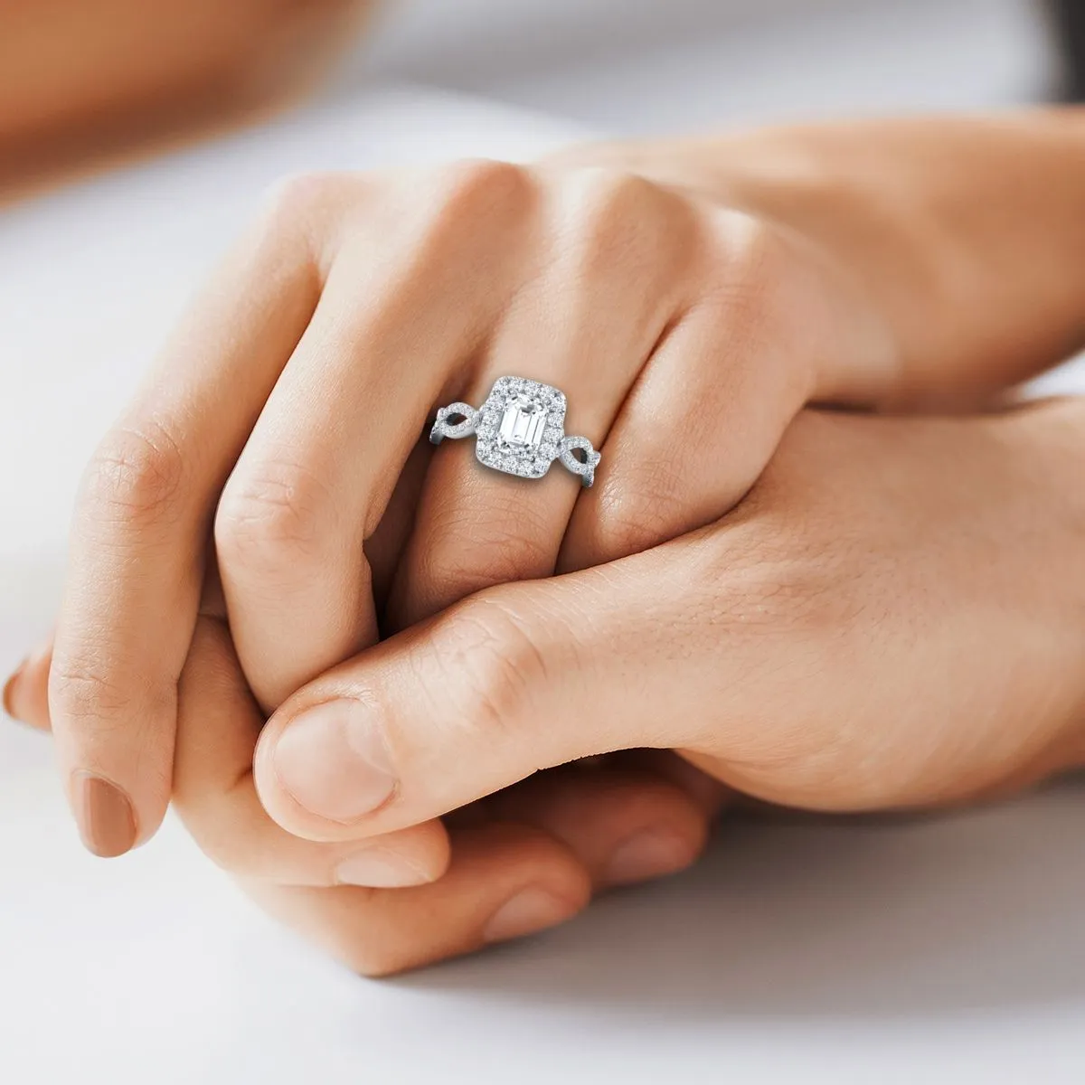 18K White Gold Emerald Cut Diamond Ribbon Twist French Pave Halo Engagement Ring -3/4ctw