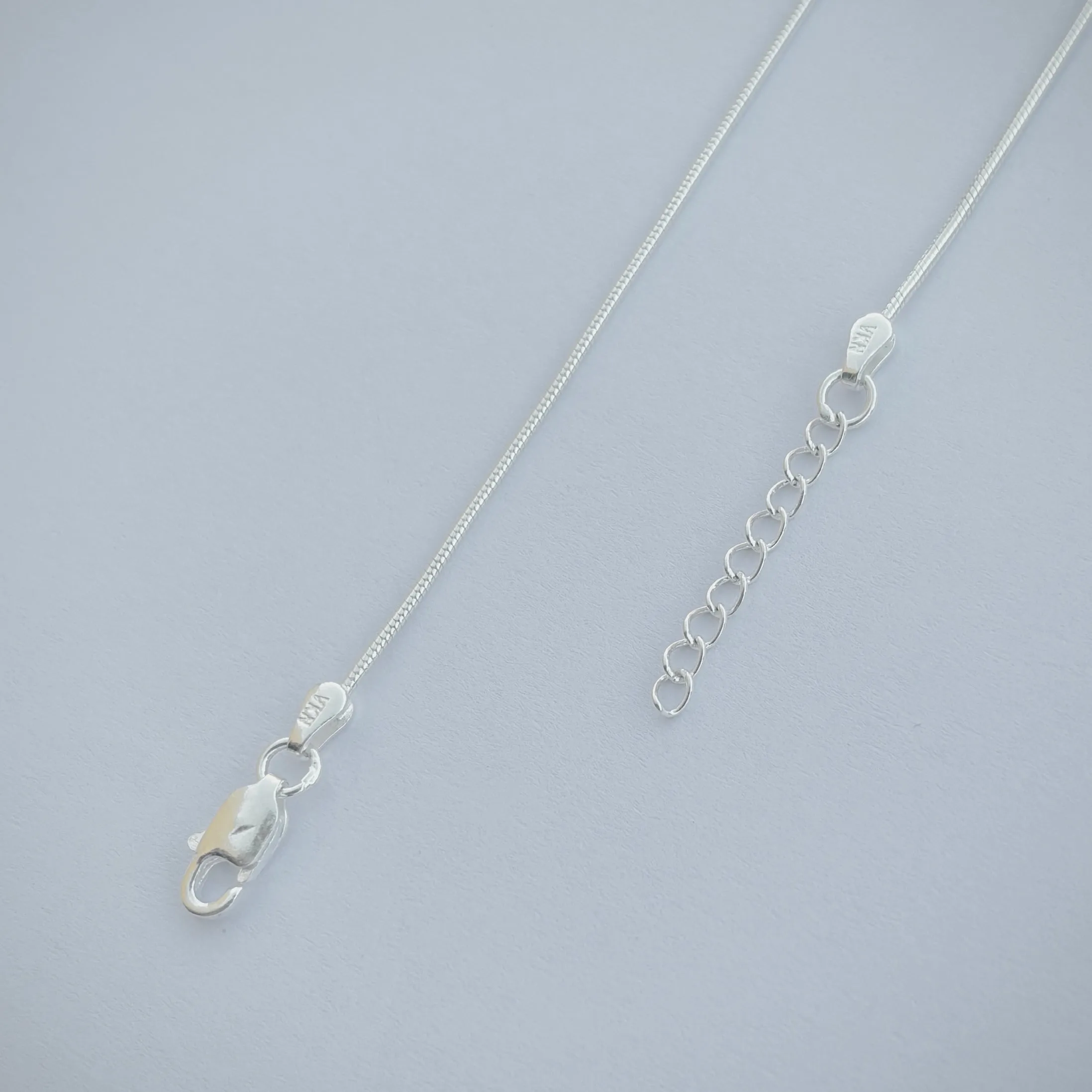 Stylish Silver Anklet with Multi-Design Beads.